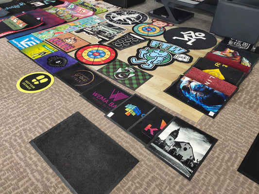 What types of custom logo mats are on sale in the market?